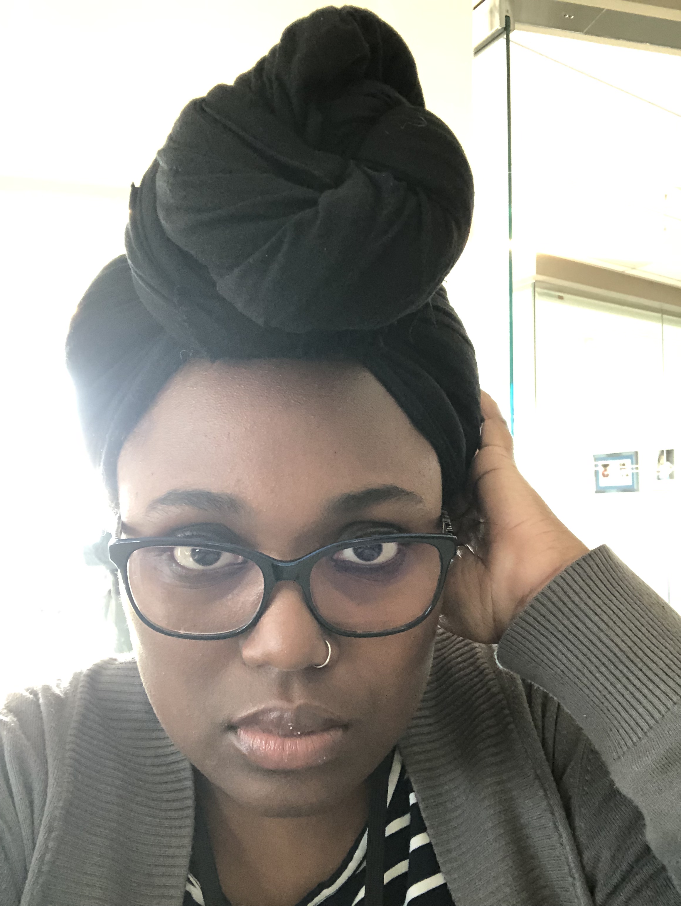 Selfie of Ally with he headwrap looking better